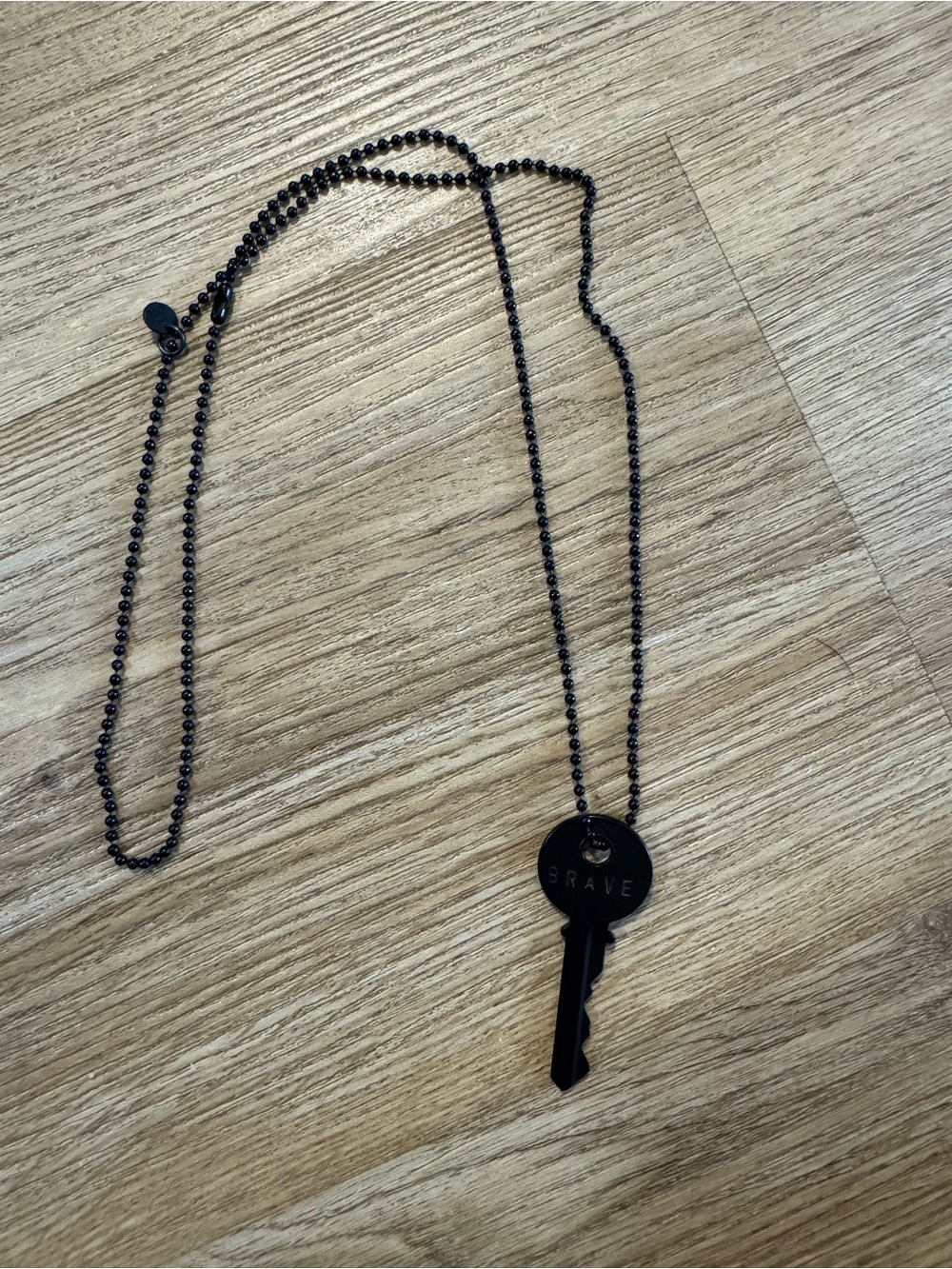The Giving Keys Black 'BRAVE' Key Necklace